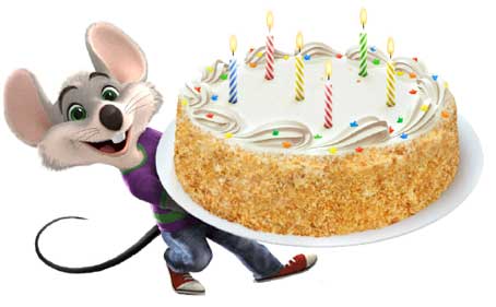 Chuck E. the mouse holding a birthday cake with candles.